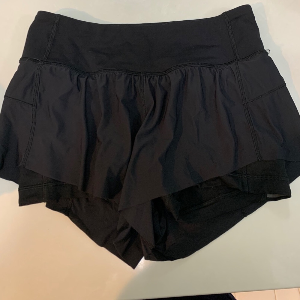 SOLD!! Like new flowy lululemon shorts 4